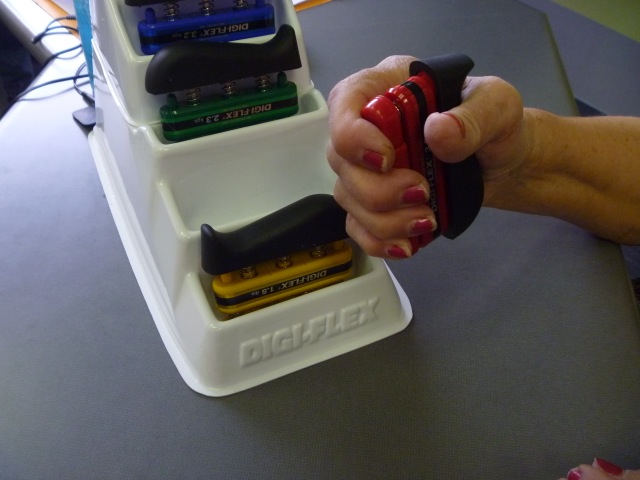 Photograph of Hand Therapy strength training with 3.0 lbs. Digi Flex